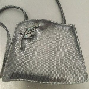 Black reptile skin cocktail bag